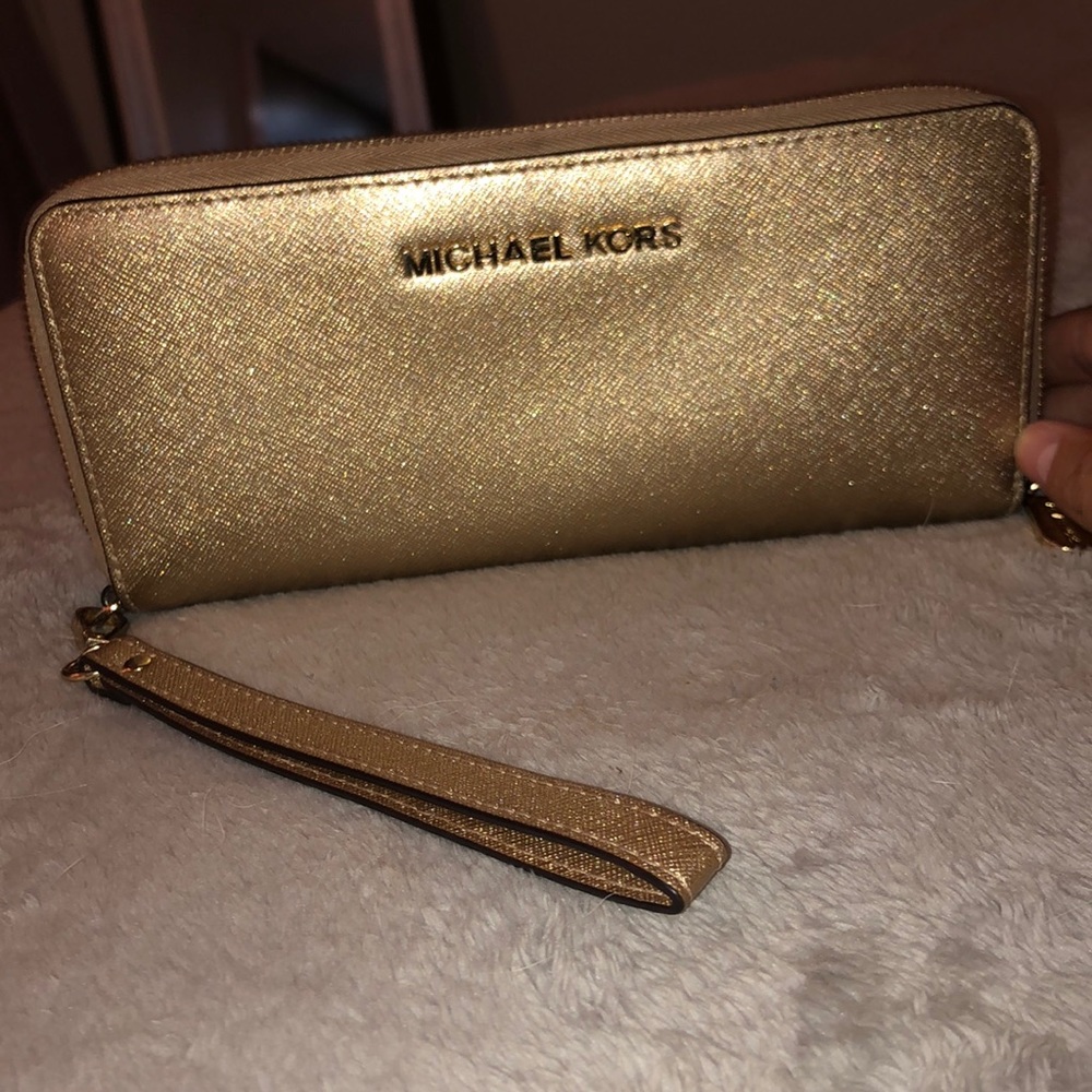 Michael Kors gold Continental wristlet/wallet
